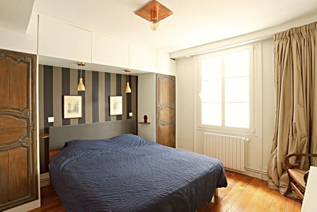 Afficher la photo en grand Appartement F4 à vendre - 4 pièces - 83,20 m2 - Paris - 75004 - ILE-DE-FRANCE