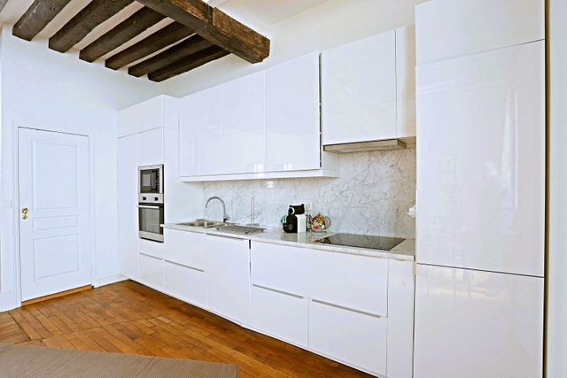 Afficher la photo en grand Appartement F4 à vendre - 4 pièces - 83,20 m2 - Paris - 75004 - ILE-DE-FRANCE
